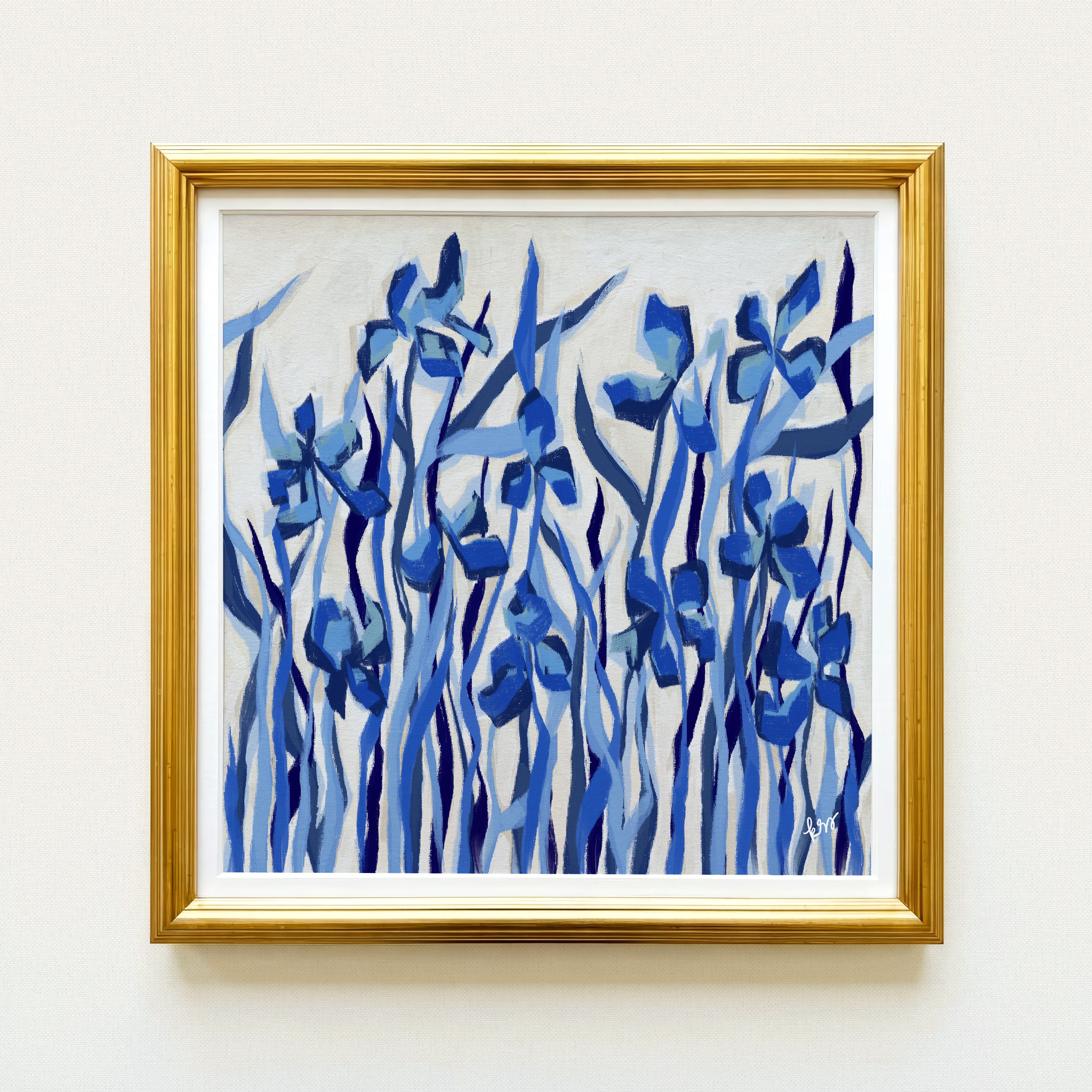 The image is a framed painting of blue flowers.