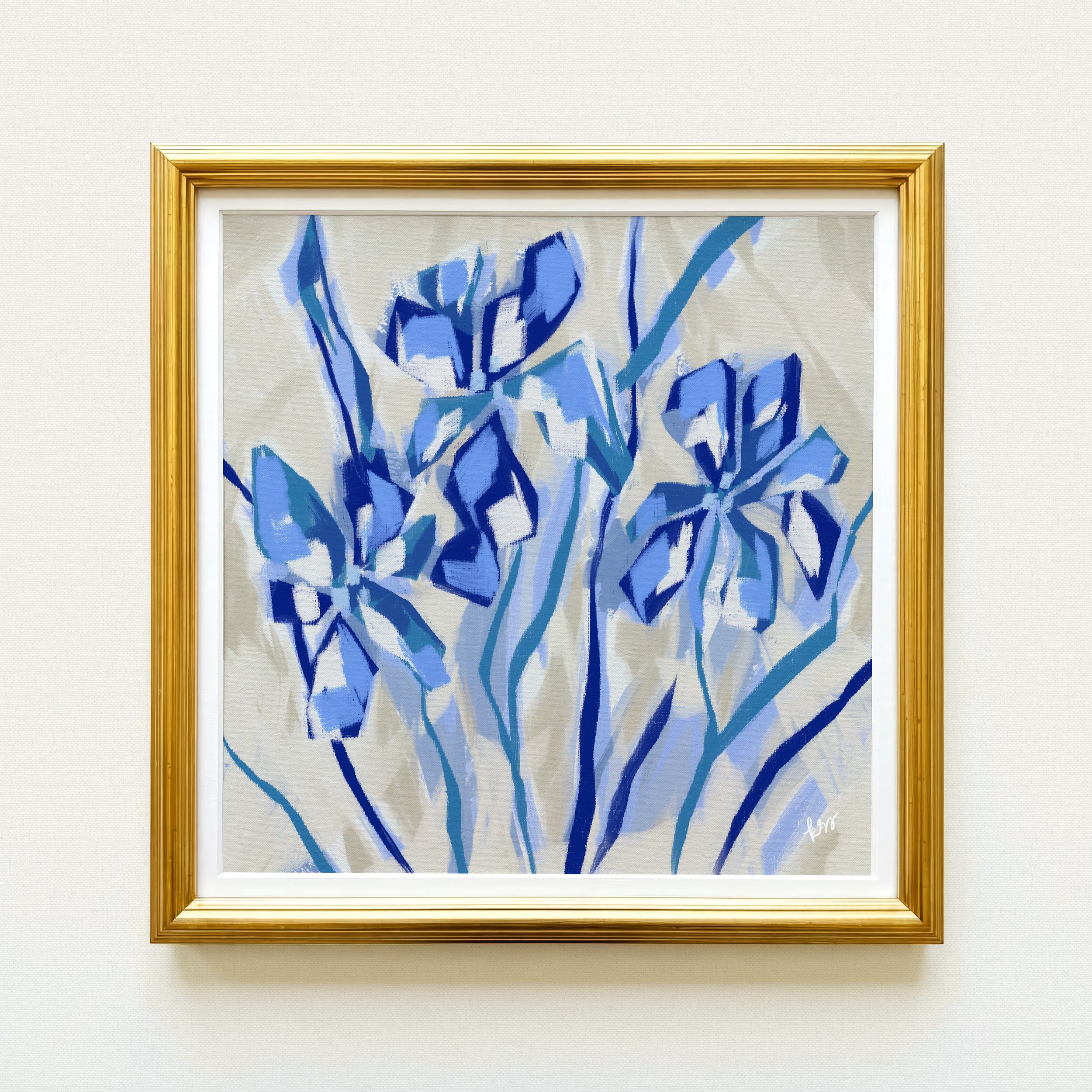 The image is a framed painting of blue flowers, with a gold frame.