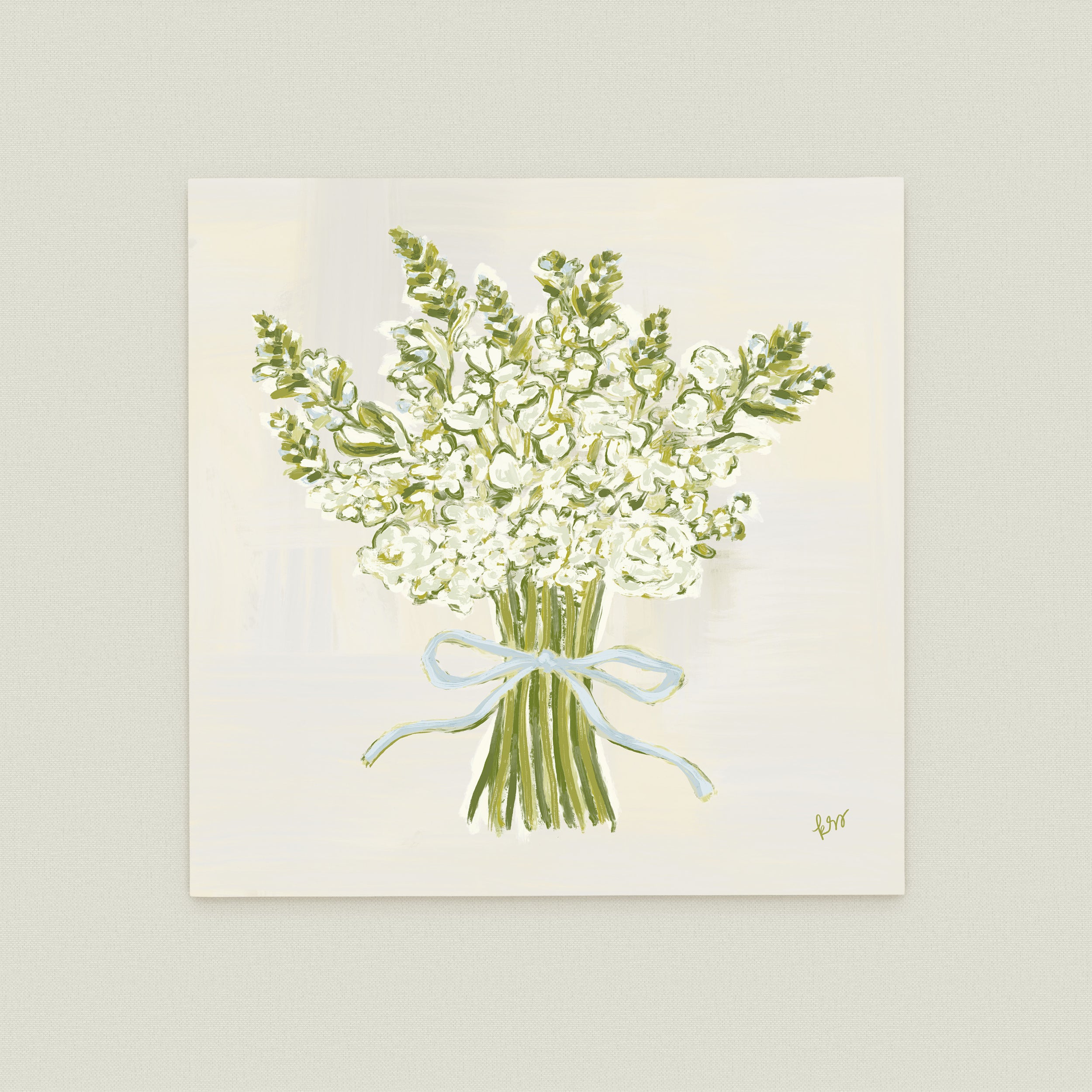 A bouquet of white flowers tied together with a blue ribbon.