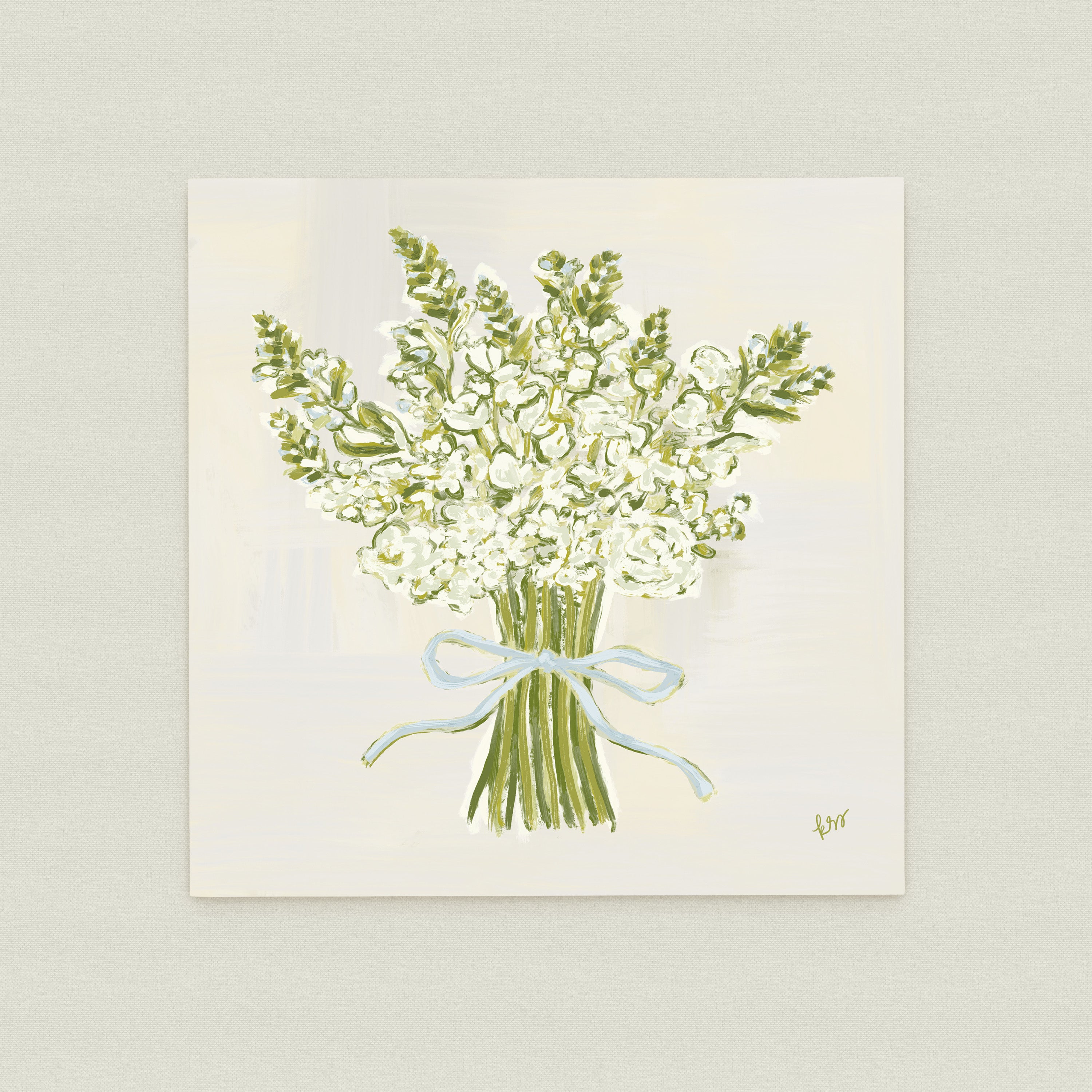 A bouquet of white flowers tied together with a blue ribbon.